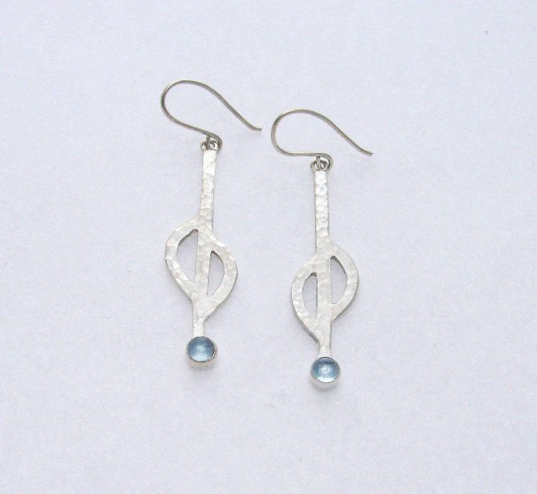 'Dappled Pools - Hammered Stirling Silver Earrings with Blue Topaz' by artist Marley McKinnie